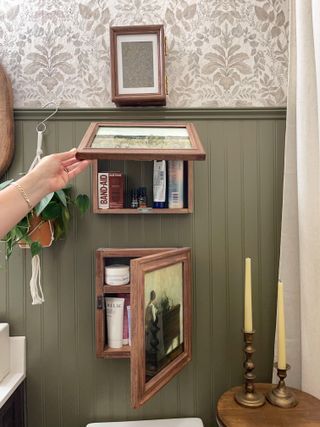 This Hidden Storage Hack is the Best Way to Disguise Unsightly Stuff in Plain Sight, and it's Easy to DIY Hidden House Storage, Creative Home Organization, Hidden Picture Frame Storage, Hidden Shelves In Wall, Inside Wood Storage Ideas, Hidden Storage Wall, Hidden Wall Storage, Picture Frame Storage, Shelving Decor Ideas