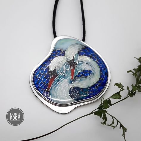 Introducing a stunning piece of handmade jewelry that captures the elegance and grace of swans. This unique brooch/pendant features exquisite cloisonné enamel work on sterling silver, creating a mesmerizing piece that is both a work of art and a wearable accessory. Each detail is meticulously crafted by the artist's skilled hand, making this jewelry a one-of-a-kind addition to your collection. Elevate your style with this beautiful swans jewelry that showcases the beauty of nature in a truly spe Swan Jewelry, Cloisonne Enamel Jewelry, Unique Sterling Silver Jewelry, Unique Brooch, Sterling Silver Brooch, Enamel Brooch, Cloisonne Enamel, Enamels, Jewelry Sterling Silver