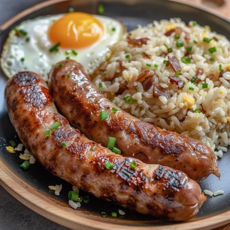 🍳 Enjoy the classic Filipino breakfast of Longsilog! 🍳✨ #Longsilog #FilipinoBreakfast Longsilog (Longanisa sausage with fried rice and egg) Ingredients: Longanisa sausages (8) Cooked rice (2 cups) Eggs (4) Garlic, minced (3 cloves) Cooking oil (2 tbsp) Salt and pepper to taste Instructions: Cook longanisa sausages in a pan over medium heat until browned and cooked through. Set aside. In the same pan, add cooking oil and sauté garlic until fragrant. Add cooked rice and stir-fry until heate... Garlic Egg Fried Rice, Longanisa Breakfast, Italian Sausage Meals, Sausage And Rice, Filipino Breakfast, Fried Sausage, Garlic Fried Rice, Instagram Recipes, Twisted Recipes