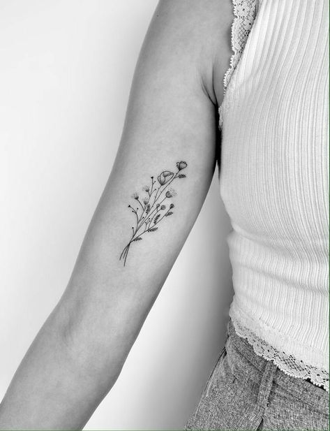 Dainty Inner Bicep Tattoos For Women, Birth Flower Tattoos Bicep, Wildflower Tattoo Inner Arm, Wildflower Tattoo Inner Bicep, Fine Line Tattoo Bicep, Flower Tattoo On Inner Arm, Fine Line Flower Tattoo Back Of Arm, Wildflower Bicep Tattoo, Wildflower Tattoo Bicep