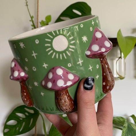 Throwback to this super cute green mushroom plant pot that is still awaiting a home (and a plant to holdddd) ✨🎨🌱🌸 Available on my website ♥️✨link in bio 🥰✨ @maycocolors on @hobbyceramicraft 🎨✨🐛 #art #artist #ceramics #pottery #painting #illustrator #ceramicstudio #potterytiktok #potterypainting #painter #mushroom #plantpot Pottery Painting Mushroom, Mushroom Plant Pot, Painting Mushroom, Green Mushroom, Mushroom Plant, Ceramics Pottery, Ceramic Studio, Pottery Painting, Website Link