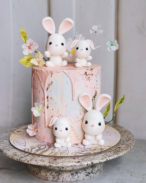 Duchess Cakes and Bakes on Instagram: “watercolor ganache + pink pastel drip + four 🐰 + @kukka.fleur + @littleitaly.id - kue yang akan selalu diingat, karena ada cerita tak…” Bunny Birthday Cake, Cake Designs For Girl, Cake Designs For Kids, 9th Birthday Cake, Bunny Birthday Party, Fondant Cake Designs, Rabbit Cake, New Birthday, 2 Birthday Cake