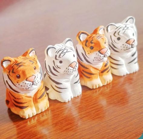 PRICES MAY VARY. Small Wooden Tiger Figurines - These cute carved wood tiger fit in the palm of your hand , orange tiger ,white tiger includes perfect cute decoration ideas for home Handmade Wood Tiger - These tiger statues are hand carved by professional artisans, using natural wood and painted with non-toxic water-based paint to match the beauty of nature. Widely Use Home Decor - The small tiger figurines can serve as home decor, gifts, designs for desks, shelves, tabletop, cabinet, office dec Small Ceramic Sculptures, Tiger Decorations, Tiger Sculpture, Desks Shelves, Tiger White, Tiger Wood, Tiger Decor, Cabinet Office, Coil Pottery