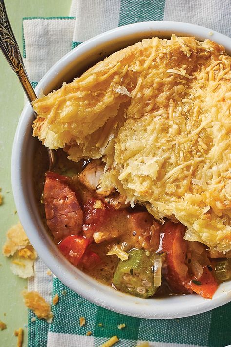 While gumbo isn’t something you normally think of for a weeknight dinner, purchased puff pastry makes the chicken pot pie part quick and easy, while Cajun seasoning brings in tons of flavor. #cuisineathome #comfortfood #comfortfoodrecipes #food #recipe Pot Pie With Puff Pastry, Pie With Puff Pastry, Okra And Tomatoes, Chicken Gumbo, One Dish Dinners, Creole Recipes, Pot Pies Recipes, Sauteed Chicken, Chicken Pot Pie Recipes