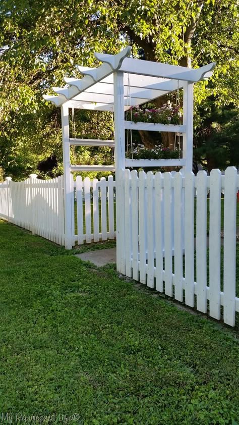 It was a big job but my white picket fence is done. This fence is totally DIY, no panels, each board cut individually and it turned out perfect. #MyRepurposedLife #outdoor #picketfence Picket Fences, Privacy Landscaping, Front Fence, Small Front Yard, Yard Fence, Patio Pergola, Pergola Design, Diy Fence, Front Yard Fence