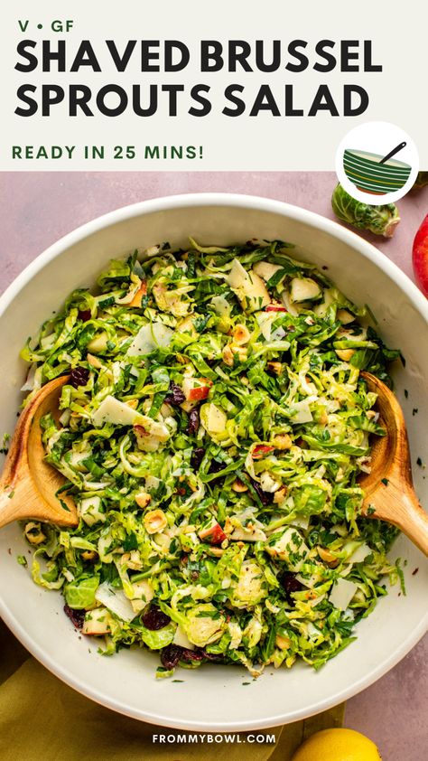 This Shaved Brussels Sprout Salad is an easy and refreshing holiday or cold-weather side dish. Shredded brussels sprouts, crunchy hazelnuts, crisp apples, and vegan parmesan coated in a bright lemony dressing. Vegan and Gluten-Free, Nut-Free Option. Shredded Brussels Sprouts Recipe, Shaved Brussel Sprout Salad, Shredded Brussel Sprout Salad, Shredded Brussels Sprouts, Sprouting Quinoa, Dairy Free Salads, Shaved Brussel Sprouts, Brussels Sprout Salad, Brussels Sprouts Salad