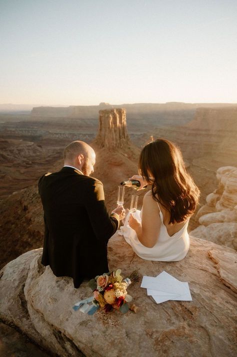 Cliffside Moab Adventure Elopement // Colorado Elopement Photographer - Picture this: you and your lover, barefoot in the desert, wind in your hair, as the desert sunset lights the canyon. Welcome to the world of Moab adventure elopements! Get inspired by adventure elopement Utah, elopement dresses, desert elopement Utah, and simple elopement picnic. Book me for your Moab elopement photos or adventure elopement at jessicaluannphoto.com! Out West Elopement, Dessert Wedding Photos, Providence Canyon Elopement, Cool Elopement Photos, Utah Elopement Locations, Engagement Photos Cliffside, Cute Elopement Ideas, Elopement Family Photos, Moab Engagement Photos