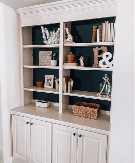 We gave our built in shelves a little more character with some black paint. Built In Cabinet Makeover, Old Built In Shelves Makeover, Built In Bookshelf Makeover, Built In Makeover, Painted Built Ins, Cupboard Decor, White Built Ins, Shelf Makeover, Office Shelves