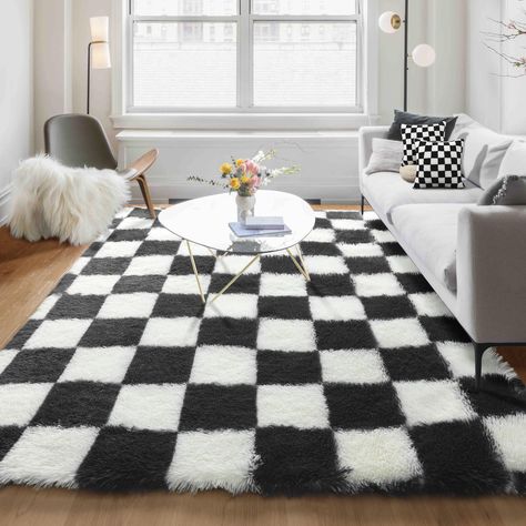 PRICES MAY VARY. Modern Design -- KICMOR black and white rug design is inspired by Checkerboard (date back to the 15th mid-century). It's a classic style that never goes out, perfect for creating aesthetic and elevate your space. If you want to add a touch of personality to your room and impress your guests, our stylish checkered area rug would be a ideal choice. Ultra Soft Fluffy Rug -- Feels like stepping on a fuzzy cloud! Our shag rug is made of microfiber and spongy interlayer, and the shagg Funk Apartment Decor, Black White And Red Living Room, Crochet Living Room Rug, Rugs For Boys Bedroom, Dark Rug Bedroom, Rug Inspo Living Room, Black White And Pink Living Room, Asthetic Rugs, Checkered Room Aesthetic