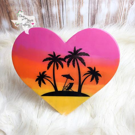 READY TO SHIP IN 3-5 BUSINESS DAYS.This painted wood heart makes a beautiful addition to your home decor. The heart is approximately 9" and is made of wood. The sunset is hand painted and the graphic detail is black vinyl. The entire front and sides of the piece are coated in a resin that gives a glass like shine and smooth appearance. The back will come unfinished. Can be displayed on a stand of your choosing (stand pictured NOT included) or you can request a metal claw hanger be added to the b Heart Shape Painting Ideas, Painting On A Heart Shape Canvas, Heart Canvas Ideas, Painting On Heart Shaped Canvas, Canvas Painting For Him, Heart Shaped Painting, Heart Shaped Canvas Painting Ideas, Heart Canvas Painting Ideas, Shaped Canvas Painting