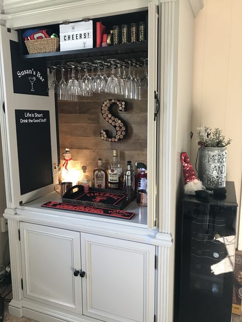 Entertainment Center Liquor Cabinet, Whiskey Bar Cabinet Ideas, Diy Bar From Tv Cabinet, Entertainment Center Turned Into Bar, Refinished Entertainment Center, Entertainment Center Bar Ideas, Repurposed Liquor Cabinet, Tv Armoire Repurposed Bar Liquor Cabinet, Entertainment Center Ideas Repurposed