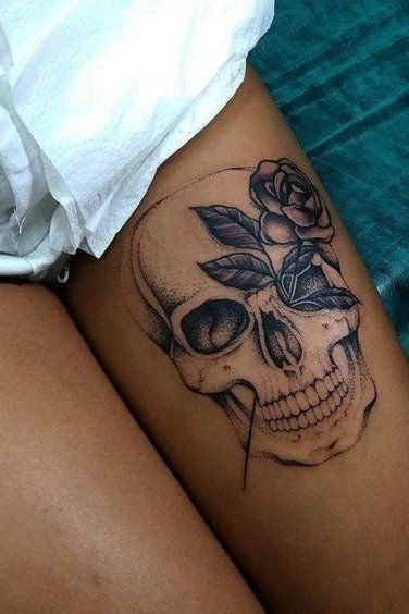 @radiantdoll 💕 Skull Back Tattoo Female, Skull Tattoos Sleeve Women, Skull Tattoos On Thigh, Tattoos With Skulls For Women, Women’s Skull Tattoo, Skull Thigh Tattoo Women, Rose And Skull Tattoo For Women, Tattoo Ideas Female Skull, Skull Tattoo Thigh