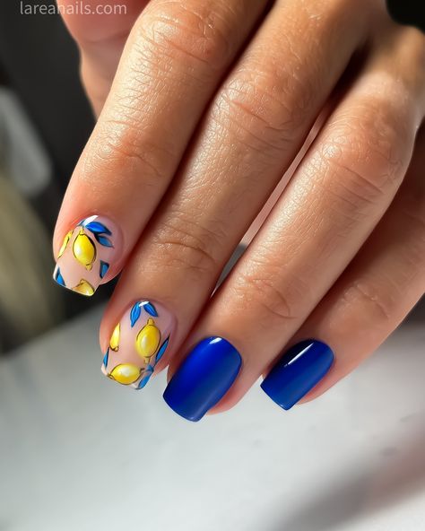 Brighten up your summer look with a blue manicure 💙 inspired by the iconic Dolce & Gabbana lemon print. 🍋🍋🍋 This vibrant nail art combines the refreshing hues of Royal blues with the zesty yellow of lemons, capturing the essence of sunny days and citrus groves. @lareanetwork #dolcegabbana #larea #njnails #russianmanicurenj #lareanails #lareanailsnj #lemonprint #lemonnails Amalfi Coast Nails Ideas, Blue And Yellow Lemon Nails, Blue And Yellow Nail Art Designs, Summer Lemon Nails, Lemon Inspired Nails, Summer Italy Nails, Almafi Coast Nails, Italy Nail Art, Lemon And Blue Nails