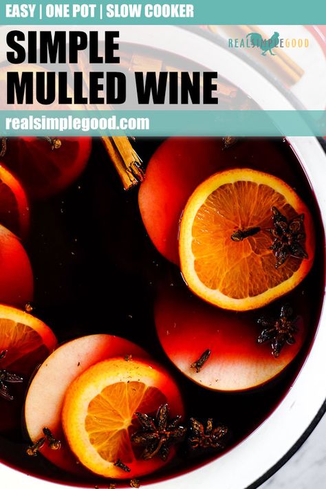 This simple mulled wine recipe will make you feel all warm and fuzzy. It's the perfect warmed spiced beverage for any holiday gathering or event! Mulled wine gets its rich, fragrant flavor from the addition of spices and some citrus and can be made with a quick simmer on the stove or in your slow cooker. If you are looking for a delicious holiday drink this simple mulled wine recipe is a must try! | realsimplegood.com #mulledwinerecipe #mulledwine #holidaybeverage Simple Mulled Wine Recipe, Mulled Wine Recipe, Spiced Drinks, Spiced Wine, Wine Recipe, Slow Cooker Apples, Holiday Drink, Beverage Recipes, Winter Drinks