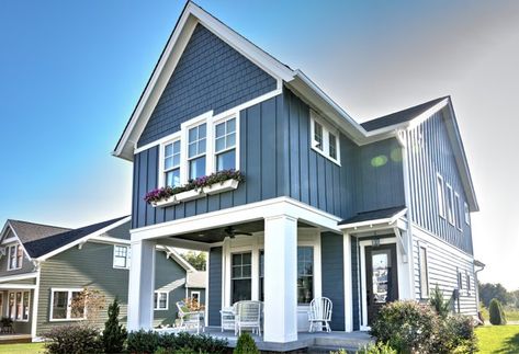 James_Hardie: This home is a great example of creating detail and texture with a variety of siding styles. Featured are HardiePlank lap siding HardiePanel vertical siding and straight-edge HardieShingle siding. If you like this color wed suggest expl https://t.co/Q8Ox9ODJ1g Coastal Exterior House Colors, Vertical Siding Exterior, Blue Vinyl Siding, Vertical Vinyl Siding, Siding Styles, Coastal Exterior, Exterior House Paint, Outside Paint, House Makeovers