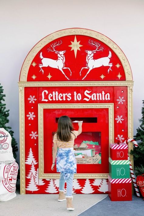 Guests can even have their picture taken with Santa Claus and Mrs. Clause in the whimsical cottage. Or drop off letters to ensure they get to the North Pole in time. North Pole Christmas Party Theme, Santa Setup Ideas, Santa’s Workshop Ideas, Santa Set Up, Santas Village Ideas, Christmas Event Ideas Activities, Christmas City Decorations, Santa's House Decorations Ideas, Playful Christmas Decor