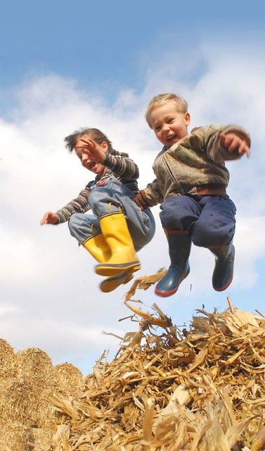 kids at Play | Two children leap from a bale of cornstalks o… | Flickr Iowa Farms, Corn Stalks, Country Kids, 인물 사진, Little People, Country Living, Farm Life, Country Life, Country Girls