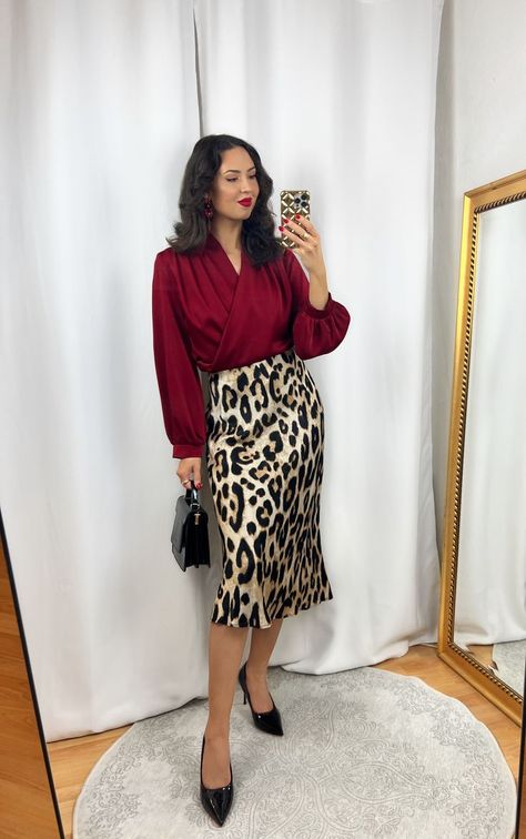 Red Blouse and Leopard Skirt Outfit Leopard And Burgundy Outfits, Red Top Skirt Outfit, Leopard Print Skirt Outfit Work, Red Top Work Outfit, Leopard Outfit Ideas Classy, Dark Red Skirt Outfit, Leopard Print And Red Outfits, Leopard Print Skirt Outfit Winter, Printed Midi Skirt Outfit