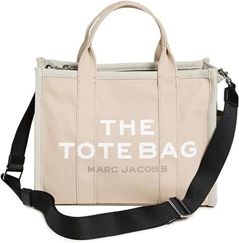 A scaled-down version of the label's signature Traveler tote, this Marc Jacobs bag is crafted from sturdy canvas and features bold block lettering for a style that's still roomy enough to take on all your weekend adventures. #ad Tote Insert, Marc Jacobs Tote Bag, Purse Organizer Insert, Marc Jacobs Tote, Purse Organization, Marc Jacobs Bag, Felt Bag, Small Tote, Travel Tote