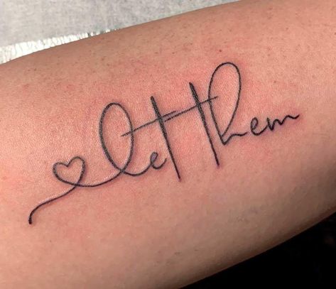 This Tattoo has gone viral along with its poem, have you read it yet? “Let Them” “Just Let them. If they want to choose something or someone over you, LET THEM. If they want to go weeks without talking to you, LET THEM. If they are okay with never seeing you, LET THEM. If they are okay with always putting themselves first, LET THEM. If they are showing you who they are and not what you perceived them to be, LET THEM. If they want to follow the crowd, LET THEM. If they want to jud... The Word Delicate Tattoo, Beautiful Sayings Tattoos, Rise Up Tattoo Symbol, Let Them Tattoo Design, Tatoos Woman Let Them, Cute Thumb Tattoos, Let Them Wrist Tattoos For Women, Trending Tattoos For Women 2024, Self Worth Tattoo Ideas