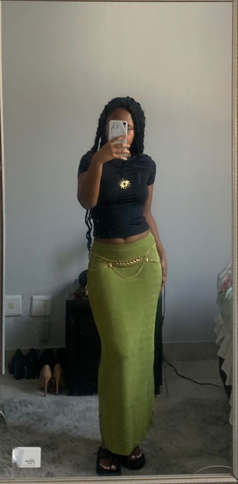 black girl wearing sage green maxi skirt and tight black top, with gold chain belt and gold star necklace Green Fitted Top Outfit, Green Skirt With Black Top, Green Maxi Skirt Outfit Aesthetic, What Top To Wear With Maxi Skirt, Maxi Long Skirt Outfits, How To Style Long Maxi Skirt, Black Women Maxi Skirt Outfit, Cute Long Skirt Outfits Black Women, Maxi Fitted Skirt