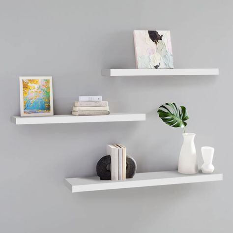 PRICES MAY VARY. 【Durability & Sturdiness】These wall mounted floating shelves are made of premium MDF and features molded trim with a neutral solid finish.Installed with sturdy mounting hardware and anchor instead of the plastic anchor. 【Floating shelves size】3 pieces white floating wall mounted shelves 16.5x4.7x0.6in/14.2x4.7x0.6in/11.8x4.7x0.6in (42/36/30x12x1.5cm) 【More storage space】Organize your home and free counter tops from clutter with the floating shelf set.These functional wall shelve Wall Shelves & Ledges, Retail Shelving, Mounted Shelves, Floating Wall Shelves, Estantes Flotantes, Store Fixtures, Floating Wall, Display Shelf, High Gloss White