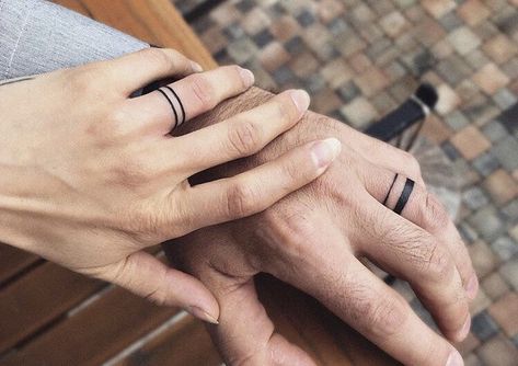 Couple Ring Finger Tattoos, Infinity Couple Tattoos, Ring Tattoo Designs, Couple Tattoos Unique Meaningful, Wedding Band Tattoo, Ring Tattoo, Wedding Ring Finger, Couple Tattoos Unique, Wedding Ring Tattoo