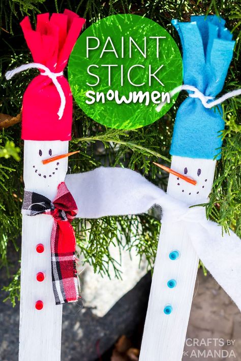 Paint Stirrer Snowman, Craft Stick Snowman, Paint Stick Holiday Crafts, Winter Crafts For Senior Citizens, Paint Stick Ornaments, Crafts With Paint Sticks, Paint Stirrer Crafts, Paint Stick Christmas Crafts, Winter Crafts For Teens