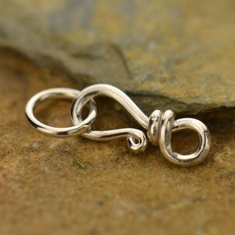 Sterling Silver Simple Hook & Eye Clasp.  A tiny and basic hook and eye clasp that is great for use with lightweight or delicate jewelry designs. The twisted wire adds a touch of extra detail, and the soldered eye ensures a secure and strong hold. Size (mm): Length: 16.5 Width: 5 Height: 3 Length measure includes both hook and eye. .925 Sterling Silver Plated in the USA. Wire Clasps For Bracelets, Wire Clasps, Clasps For Jewelry, Wire Clasp, Bijoux Fil Aluminium, Necklace Clasps, Clasp Bracelet, Diy Wire Jewelry, Jewelry Clasps