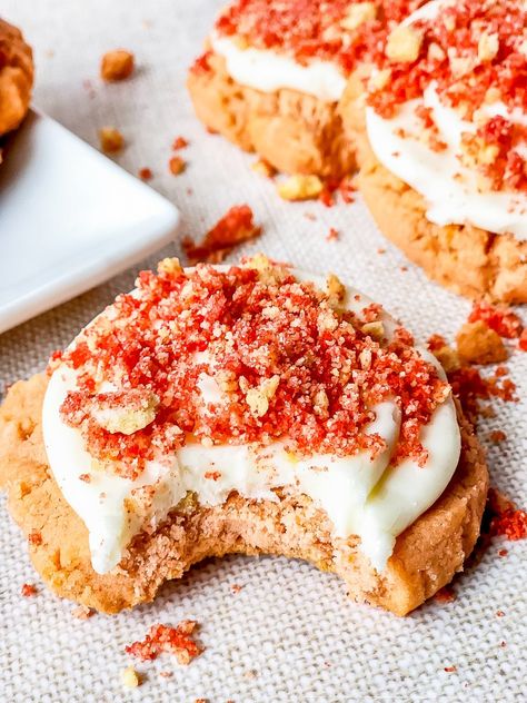 Strawberry cookies topped with cream cheese frosting and sprinkled with strawberry shortcake crumble—these Strawberry Shortcake Cookies are sure to be your next family favorite. Crumbl Cookie Strawberry Shortcake, Strawberry Shortcake Cookie Recipe, Crumble Strawberry Shortcake, Strawberry Cream Cheese Cookies Recipes, Crumbl Strawberry Cookie, Crumbl Strawberry Shortcake Cookies, Strawberry Cookies From Cake Mix Recipes, Strawberry Shortcake Cookies Recipe, Strawberry Crumble Cookies