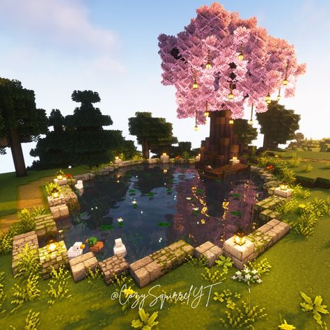 Cherry Blossoms over a duck pond 🦆 MayCraft Building Challenge - Part 1 Texture - Mizuno's 16 Craft Shader - Complementary Mod - Duckling Mod #yumimigaming #mcmaycraft #minecraft #cottagecore #cottagecoreminecraft #aesthetic #aestheticminecraft #minecraftmods #minecraftcustomtree #minecraftcherryblossoms #duckpond #minecraftdecorations #decorations #cozygaming #cozygamer #cozysquirrelyt Minecraft Building Ideas Pond, Cherry Wood Farm Minecraft, Stone Floor Ideas Minecraft, Ponds In Minecraft, Minecraft Duck Pond, Sakura Pond Minecraft, Blueberry House Minecraft, Wedding Venue Minecraft, Minecraft Village Ideas Cherry Blossom