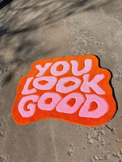 Pink and Orange "You Look Good" tufted rug. 100% acrylic with charcoal felt backing. This rug is 4ft x 4ft but is totally customizable with your choice of colors and size (up to 5ft x 5ft)! FREE US SHIPPING! Colorful Rug Decor, Pink Orange Rug, Orange Tufted Rug, Pink And Orange Rug Bedroom, Pink Orange Apartment, Pink Orange Asthetics, You Look Good Rug, Orange And Pink Rug, Orange And Pink Interior