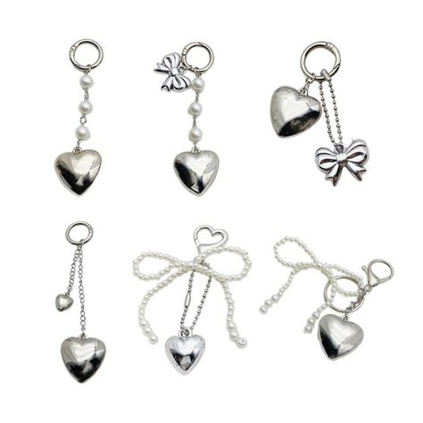 Eye Catching Heart Pendant Keyring Bag Ornament Handcrafted Accessory Keychains Features: This silver heart keychain features a unique 3D and is made from metal. It adds a touch of style to your everyday life. Lightweight and portable, this keychain can be easily attached to your belongings. Its silver finish enhances its appeal. Suitable for individuals who appreciate fashionable accessories. It makes a great for anyone looking to add a personal touch to their style. Whether you're going about your daily routine or attending special occasions, this keychain complements any setting. Attach it to your belongings for added charm. With its eye catching designs, this keychain is sure to draw attention wherever you go. Its silver color adds elegances, making it a perfect for love ones or a trea Keyring Ideas, Locket Design, Pendant Keychain, Fashionable Accessories, Silver Keychain, Heart Keyring, Beading Jewelery, Zip Puller, Love Shape