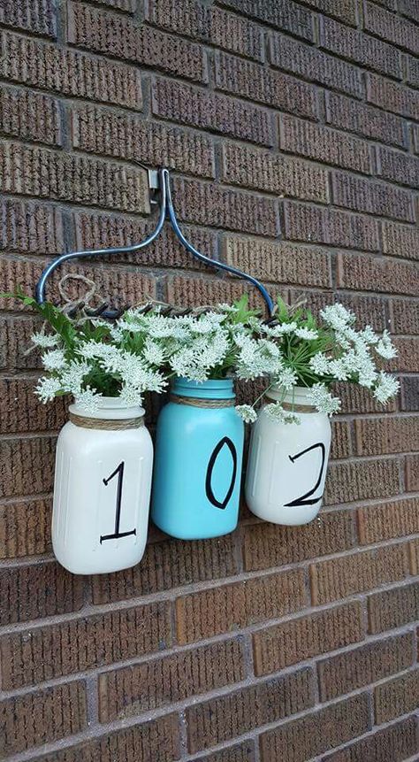 Mason jar house number Farmhouse Front Porches Decorations, Rustic Farmhouse Front Porches, Unique House Numbers, Number Ideas, Farmhouse Front Porches, Milk Jugs, Diy Outdoor Decor, Farmhouse Front, Front Porch Decorating