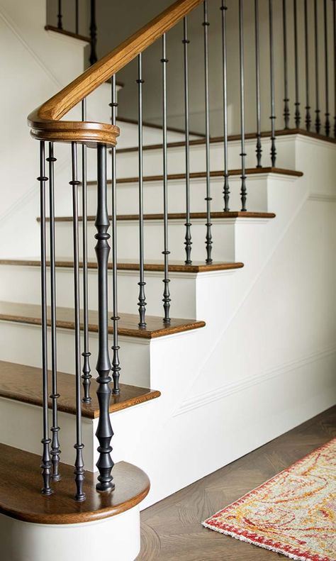 Historic residence in Portland gets modern update with a twist Reling Design, درابزين السلم, Stair Railing Makeover, Case Minecraft, Interior Stair Railing, Wrought Iron Stair Railing, Staircase Railing Design, Handrail Design, Iron Stair Railing