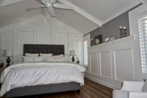 Room With Slanted Ceiling, Bedroom Wainscoting, Bedroom Accent Wall, Wainscoting Wall, Wainscoting Bedroom, Vaulted Ceiling Living Room, Bedroom With Sitting Area, Bedroom Orange, Bedroom Accent