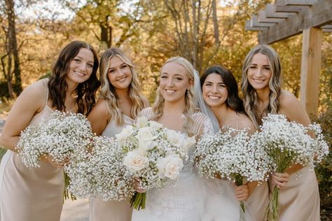 garden wedding with baby's breath and white roses, and champagne bridesmaid dresses Babies Breath Bouquet Bridesmaids, White Roses And Babies Breath Wedding, Bridesmaid Bouquet Baby Breath, Baby Breath Bouquet Bridesmaids, Baby’s Breath Bridesmaid Bouquets, Babysbreath Bridesmaids Bouquet, Babies Breath Bridesmaid Bouquet, White Rose And Baby Breath Bouquet, Baby’s Breath Wedding Bouquet