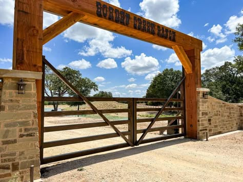 Ranch Entryway Driveway Gate Ideas, Rustic Gates Entrance Metal, Rock Entryway Front Gate, Metal Front Gate Entrance Driveway, Ranch Arch Entrance, Cattle Gates Ideas, Gated Neighborhood Entrance, Security Gates Entrance, Ranch Front Gate Entrance