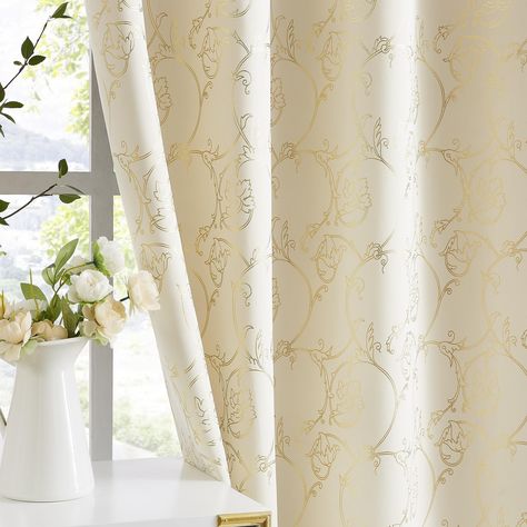 PRICES MAY VARY. READY MADE: One pair set, includes 2 panels room darkening curtains, each panel measures 52 inch wide by 84 inch long and with 8 matte silver standard size grommets. DESIGN & DECORATION: The entire curtain panel is printed with a luxurious scroll floral pattern in gold on a beige base. Modern design makes the curtains have good decorative effect. Suitable for bedroom, living room, dining room, etc. EFFECTIVE LIGHT BLOCKING: Curtains have 100% full blackout properties that can bl Insulated Window Treatments, Insulated Drapes, Pattern Draping, Thick Curtains, Gold Curtains, Drape Panel, Scroll Pattern, Darkening Curtains, Velvet Curtains