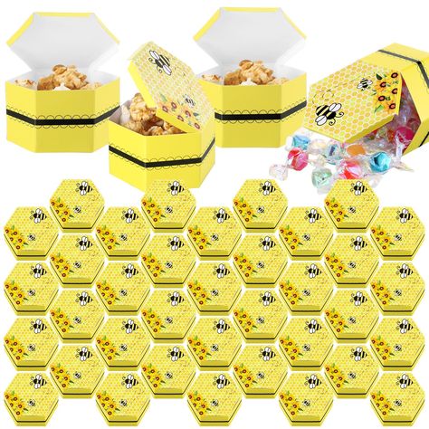 PRICES MAY VARY. Package Included: you will get 50 pieces beehive favor boxes and 1 roll of double side tapes, comes in flat paper state, assemble required, ensuring you have enough treat boxes to cater for most of your guests during parties, weddings, baby showers, or many other significant celebration Unique Hexagonal Design: our bee baby shower gift box has a unique hexagonal design after folding; The surface of the box is mainly yellow and black, with bees, honeycombs and flowers printed on Bee Themed Baby Shower Table, Bee Theme Gifts, Pooh Baby Shower Thank You Gifts, Winnie The Pooh Birthday Goody Bags, Bees Theme Party, Bee Party Decorations, Farmer Baby, Resident Events, Honey Bee Baby Shower