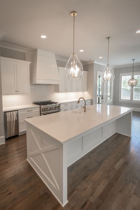 Pristine white kitchen with brass hardware and finishes Modern Kitchen Design White Shaker Cabinets, Kitchen Small White Cabinets, Farmhouse Kitchen Island White, Kitchen Interior Gold And White, All White Shaker Kitchen, White And Bright Kitchen, White Countertops White Cabinets Kitchen, Modern White Kitchen Design With Island, White Kitchen Farmhouse Modern