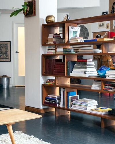 Have a large, open space that needs some privacy? This loft, originally seen on Remodelista, shows how a large bookcase is the perfect piece for the job. Room Divider Ideas Diy, Room Divider Diy, Bookshelf Room Divider, Mid Century Modern Bookcase, Modern Room Divider, Diy Room Divider, Modern Bookcase, Room Partition, Interior Modern