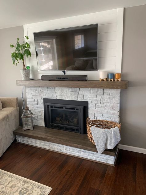 DIY Fireplace Transformation 2.0 Diy Electric Fireplace With Hearth And Mantle, Diy Gas Fireplace Mantle, Brick And Shiplap Electric Fireplace, Cover Stone Fireplace With Shiplap, Wood Hearth Fireplace, Faux Brick Fireplace Diy, Brick Shiplap Fireplace, Diy Fireplace With Hearth, Diy Hearth For Fireplace