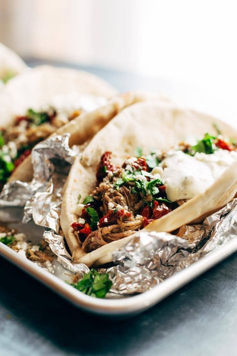 Everything Greek Pork Pitas - peppery pork with tzatziki, parsley, sun dried tomato, feta, and lemon juice. works in the Instant Pot! #instantpot #dinner #recipe #easyrecipe #yum | pinchofyum.com Yummy Pork Recipes, Greek Pork, Crispy Oven Fried Chicken, Pita Recipes, Pinch Of Yum, Lomo Saltado, Healthy Instant Pot Recipes, Sun Dried, Greek Recipes