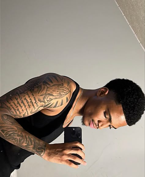 Tattoo Biceps Men, Time Tattoo Ideas For Men, Blackman Tattoo, Black Male Tattoo Ideas, Bicep Sleeve Tattoo Men, Outside Bicep Tattoo Men, Boy Arm Tattoos, Tattoo Ideas For Men Bicep, Bicep Tattoo Men Ideas