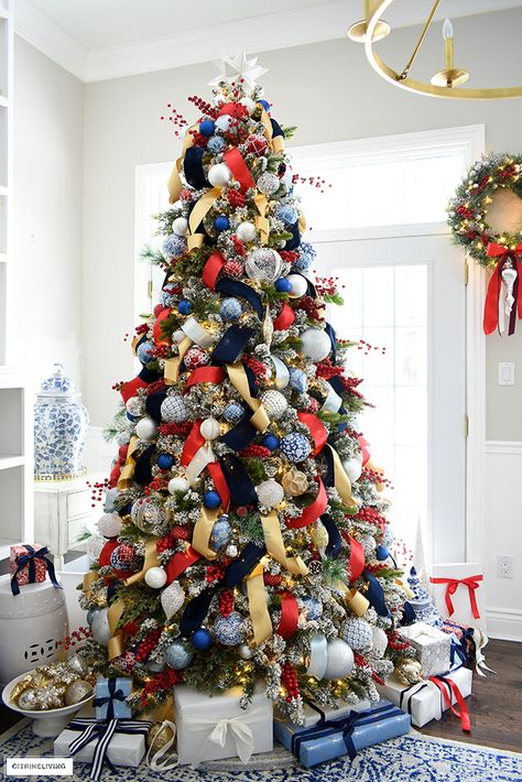 Blue Red Silver Christmas Tree, Bell Themed Christmas Tree, Red Gold Blue Christmas Tree, Red White And Blue Christmas Tree, Blue And Red Christmas Tree, Blue And Red Christmas, Blue Christmas Tree Decorations, Flocked Christmas Trees Decorated, Look Rich