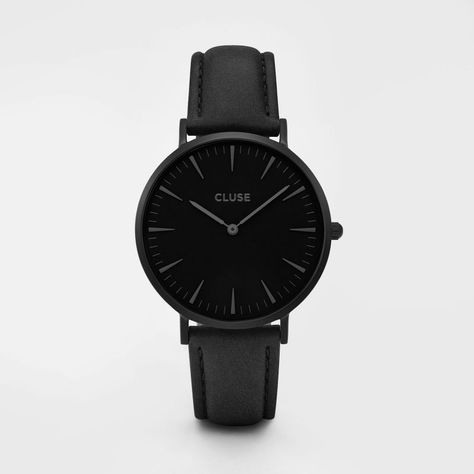 CLUSE La Bohème Full Black  This La Bohème model features an ultrathin case with a 38 mm diameter, crafted with precision for a sophisticated and elegant result. Matte black is combined with a black leather strap, detailed with a matte black clasp. The strap can be easily interchanged, allowing you to personalise your watch. Boho Watch, Slim Watches, Bohemian Style Jewelry, Black Leather Watch, Bohemian Jewellery, Boho Chic Jewelry, Boho Style Jewelry, Leather Strap Watch, Chic Leather