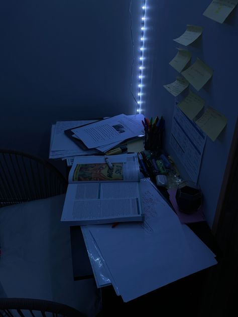 study material set up on a desk with post it notes on the wall and led lights in the background Blue Work Aesthetic, Blue Aesthetic Studying, Navy Blue Study Aesthetic, Dark Blue Study Aesthetic, Midnight Study Aesthetic, Mindmaps Aesthetic, Study Blue Aesthetic, Studying At Night Aesthetic, Dark Blue Study