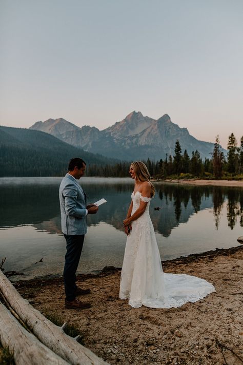 Intimate Vows at Redfish Lake in Stanley Idaho at Sunrise for Stacie and James' elopement // #sunrise #firstlook #stanley #idaho #lake #jacksonhole #wedding #brideandgroom #bride #adventure #adventurewedding #adventureelopement #mountains #rockymountains #elopementday #vows #ido Wallowa Lake Wedding, Redfish Lake Idaho Wedding, Mountain Lake Elopement, Stanley Idaho Wedding, Mountain Wedding Fall, Mountain Elopement Dress, Lake Wedding Pictures, Mountain Micro Wedding, Mountain Lake Wedding