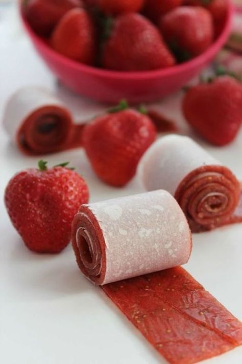 13 Healthy Kids Snacks - Healthy Snacks for Kids - Homemade Fruit Roll-ups - Ditch the store-bought version full of ingredients you can't pronounce. This one's just as tasty, and the kids can still play with their food. Click through redbookmag.com for more fun snack ideas. Strawberry Roll Ups, Fruit Rollups, Finger Snacks, Fruit Leather Recipe, Diy Snacks, Fruit Roll, Fruit Leather, Fruit Roll Ups, Strawberry Fruit